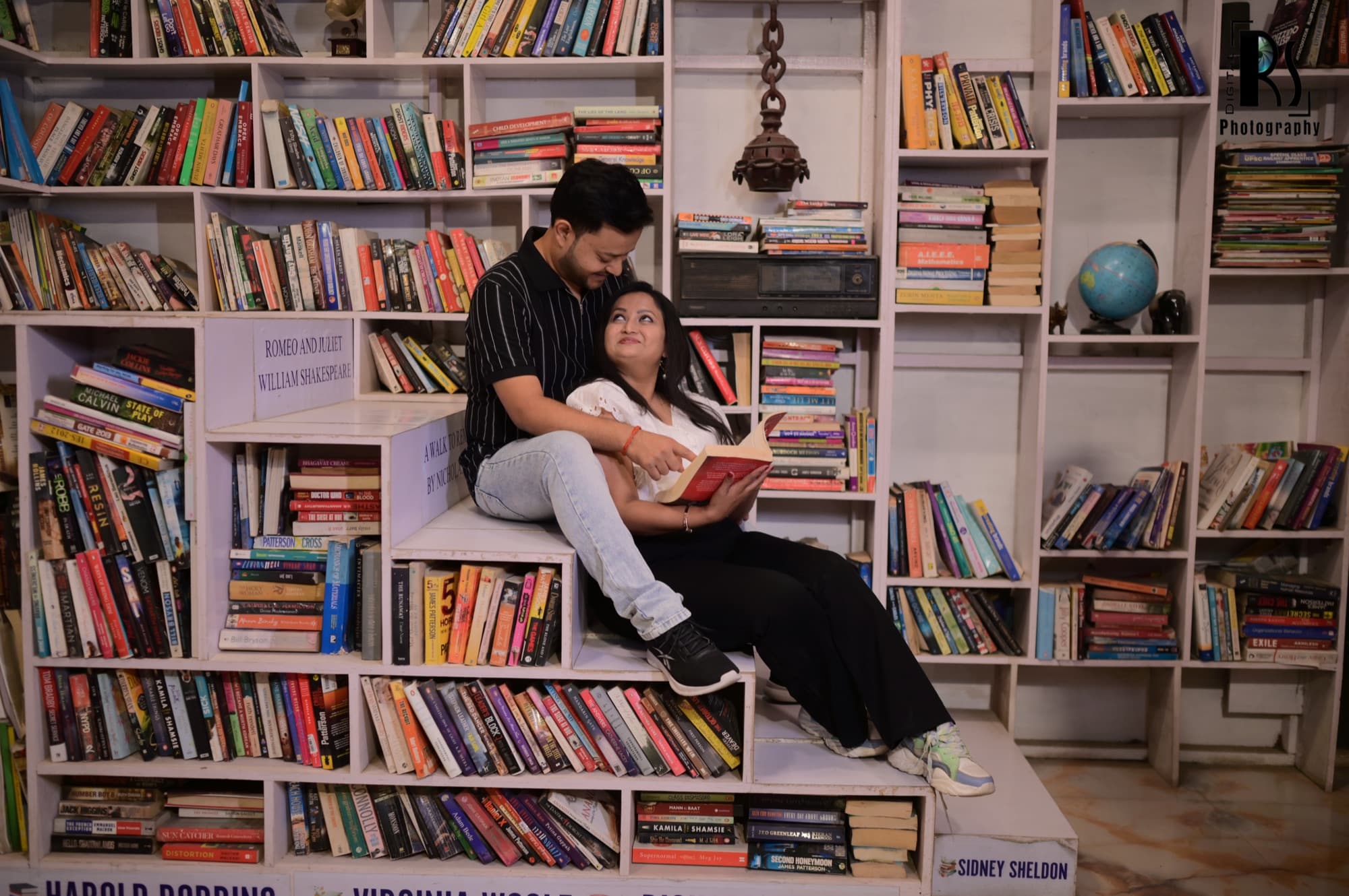 Payal & Mukul — bookshelf reading
